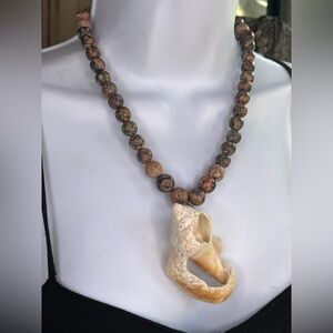Elegant Beaded Necklace with Shell Pendant